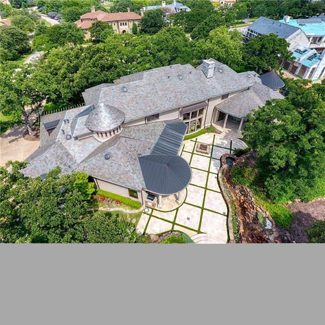 Top Drone view of the house and trees