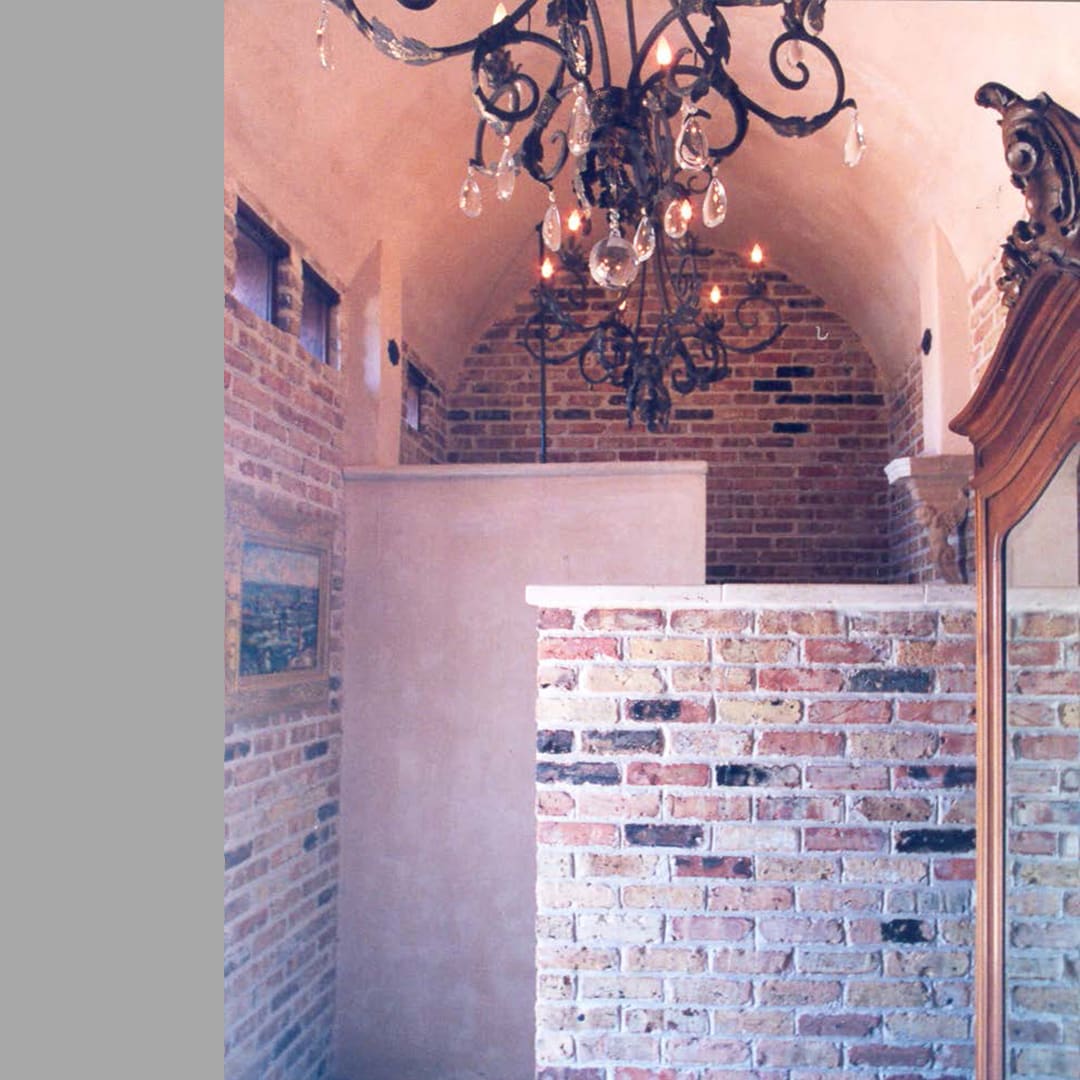 Close up view of the brick wall with ceiling lights